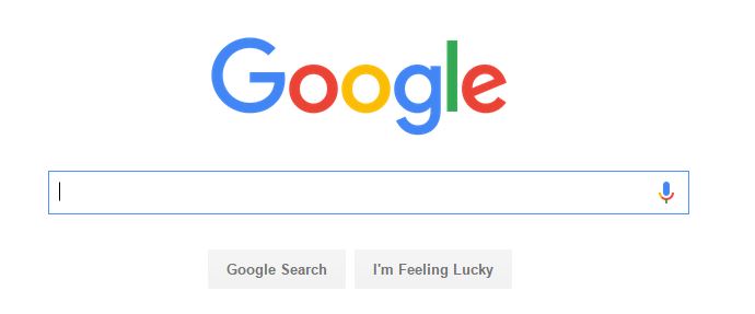 The Google search homepage features the iconic Google Logo, a search bar, a “Google Search” button, and an “I’m Feeling Lucky” button.