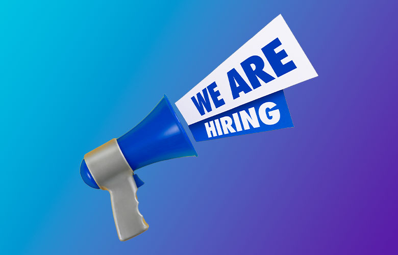 Image of a blue megaphone with a banner coming out saying "WE ARE HIRING" on a blue and purple gradient background.