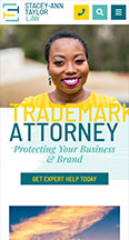 A woman smiles at the camera in the top section of an advertisement for a trademark attorney service by Stacey-Ann Taylor Law, with the text "Protecting Your Business & Brand" and "Get Expert Help Today.